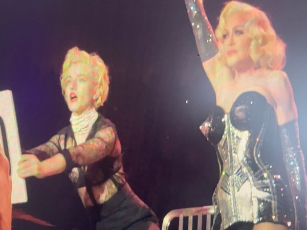 Julia Garner joins Madonna on stage
