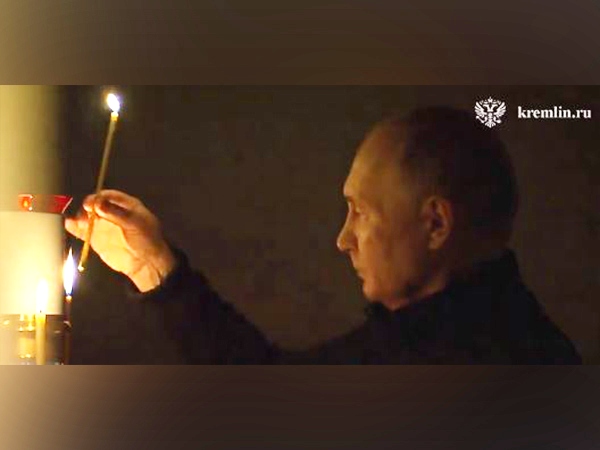 Russian President Putin lights candle for victims of Moscow terror attack